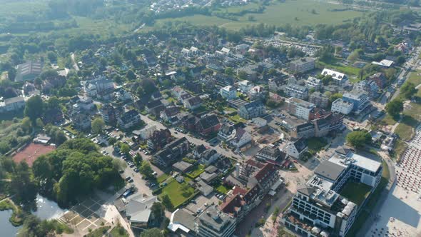 Aerial Drone Flying Above City of Scharbeutz in Germany Circle Pan Day