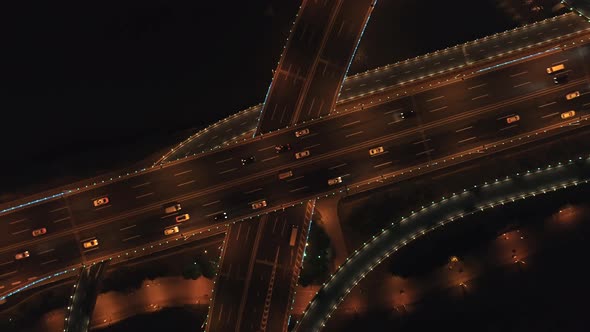 Aerial Top View of Highway Interchange at Night