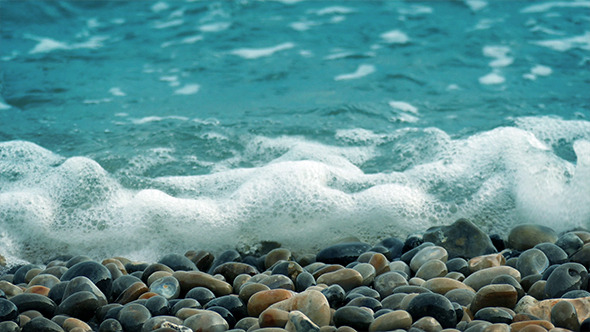 Waves Over Beach Pebbles