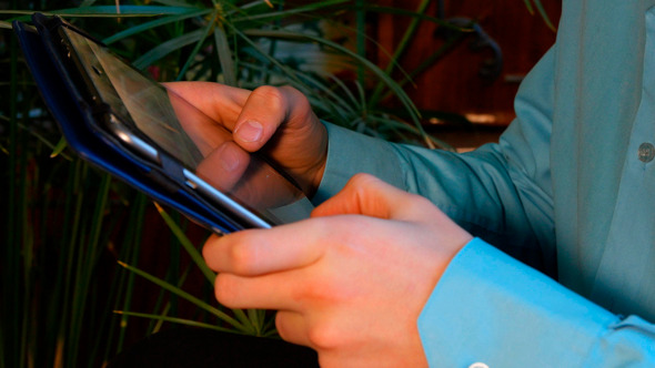 Businessman Hands Using Tablet Computer