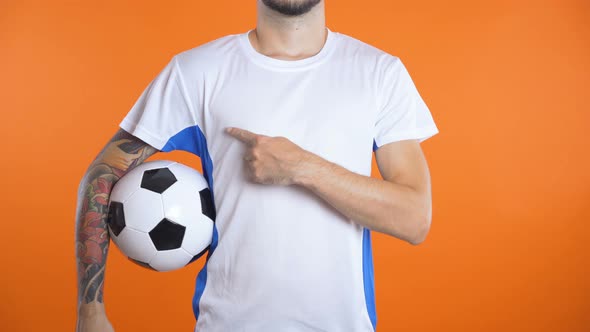 Man in Blank Football Shirts Pointing Advertise