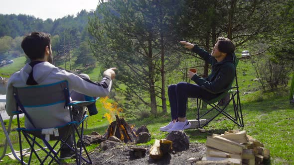 Camping activity and campfire.