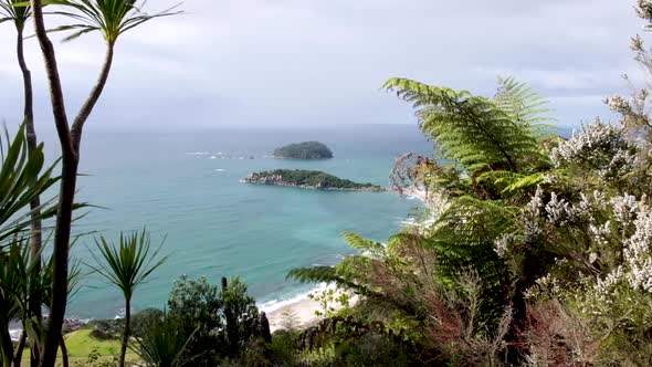 The view of the peninsula, beach, ocean and islands from Mount Maunganui in Tauranga, New Zealand Ao