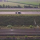 Overhead View of Cars Driving on a Highway Next to a Railroad During Summer in Belgium Europe - VideoHive Item for Sale