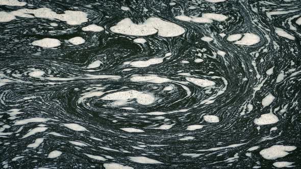 River Foam Swirling In Circle