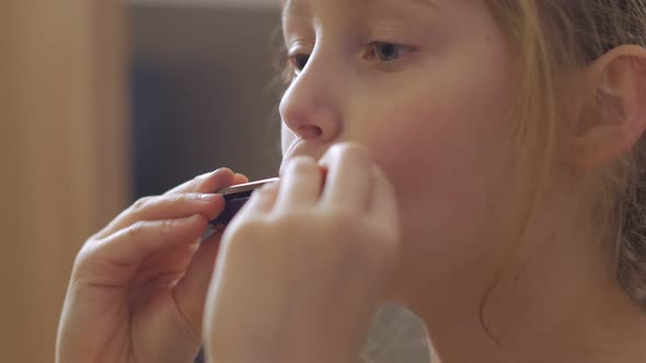 Little Girl Playing Harmonica