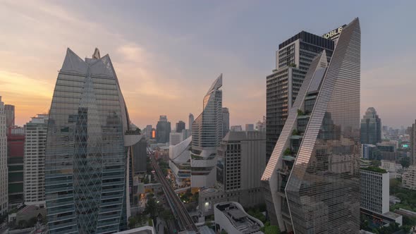 Day to night time lapse of Ploenchit, Bangkok Downtown. Financial district and business