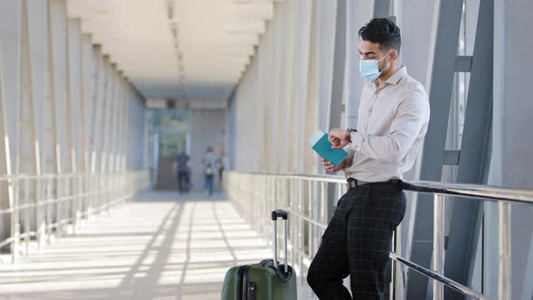 Hispanic Male Passenger Business Man Wears Formal Clothes and Face Protective Medical Mask Holds