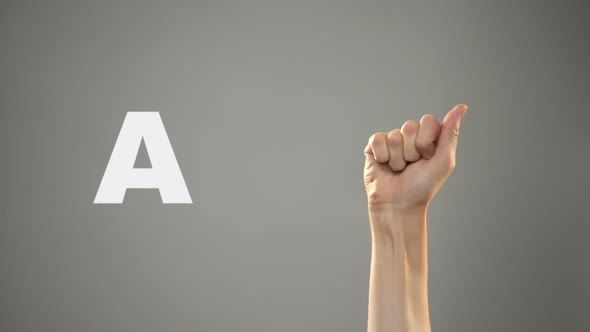 Letter a in Sign Language, Hand on Background, Communication for Deaf, Lesson
