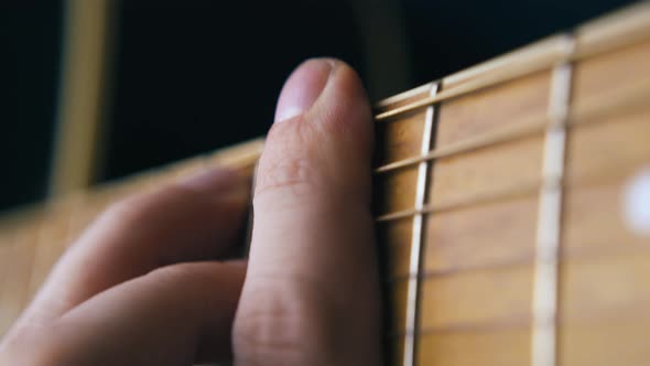 Professional Musician Practices Barre Chord Covering Strings