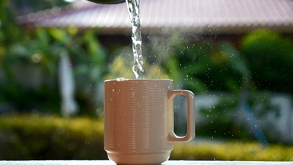 Hot Water Pouring in Cup