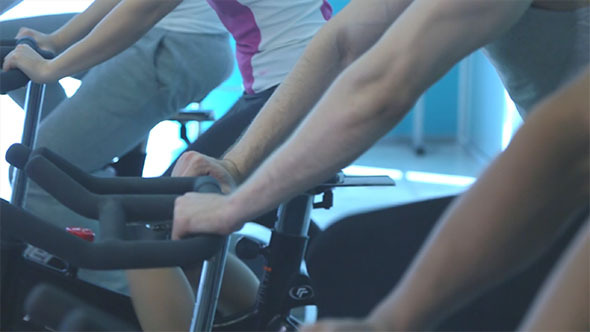 People Doing Exercise on the Exercise Bike