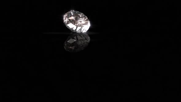 Diamond Drops onto Shiny Black Surface