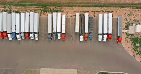 Aerial View of Parking Lot with Trucks on Transportation of Truck Rest Area Dock