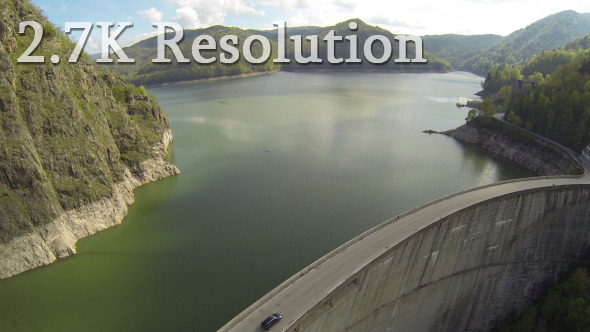 Flying over Car on Hydroelectric Dam 2