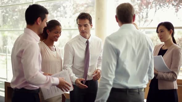 Project team members greeting each other