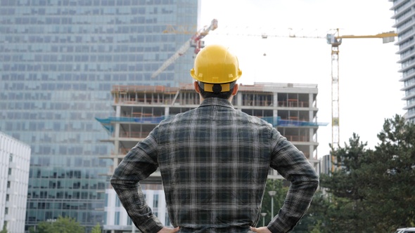 Architect Looking on Construction Process on A Sunny Day.