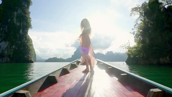 Girl Standing on a Boat