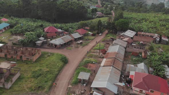 Aerial drone shot of a cozy humble neighbourhood in Uganda, Africa.