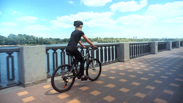 Cyclist Happy Cycling Travel Woman Rider On Bicycle. Girl Helmet Cycling On Bike Sport Recreation.