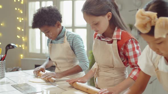 Kids Rolling Dough during Cooking Lesson