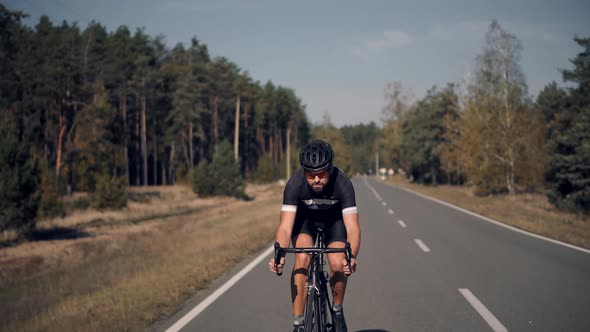 Cyclist Biking On Carbon Bike. Professional Road Bicycle Racer Cycling Training. Bicycle Cardio.