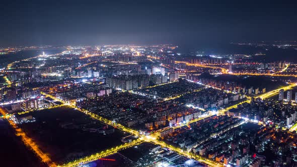 Aerial top view of city at night，timelapse