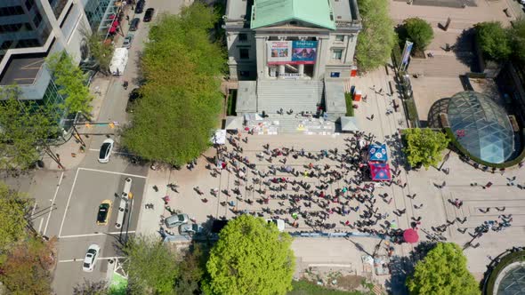 Anti-mask protest in Vancouver Canada, overhead drone shot. Anti-vax right-wing people at a rally to