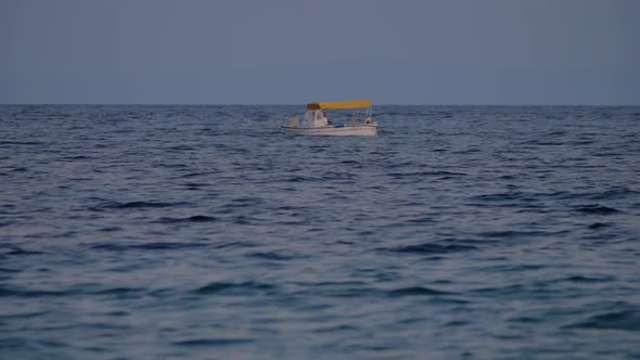  - Boat Swinging on Sea Waves