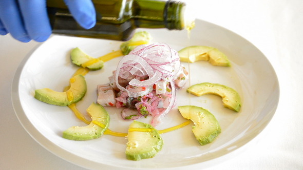 Add Oil to a Ceviche with Avocado
