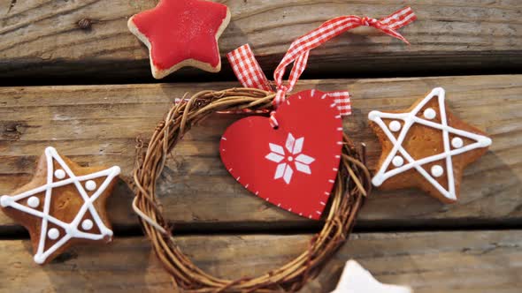 Christmas cookies and decoration on wooden table