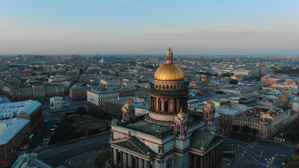 Russian cult art Isaak cathedral zoom in gold dome over city