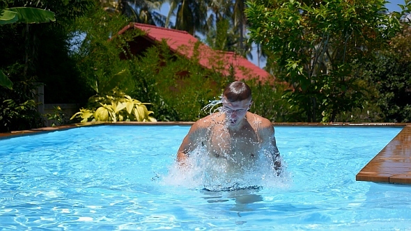 Man in Pool in Slow Motion