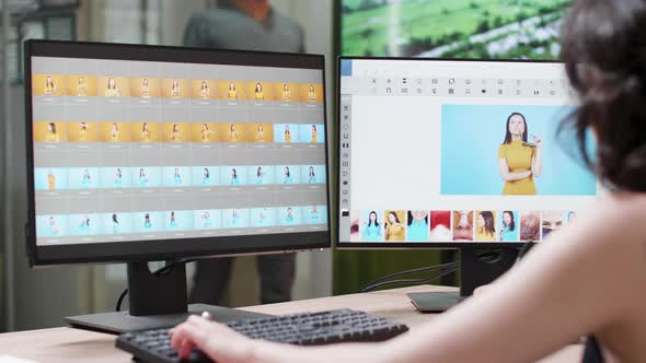 Professional Female Photographer Uses a Pro Editing Software