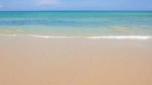 Beautiful tropical beach sea ocean with blue sky and white cloud