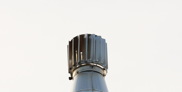 Rotor Unit Spinning On Steel Smokestack