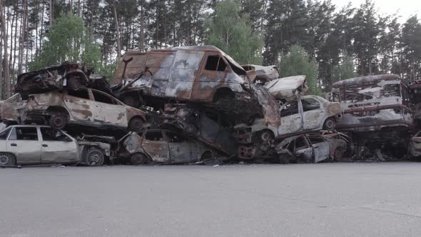 War in Ukraine a Dump of Burned Cars in Irpin Bucha District