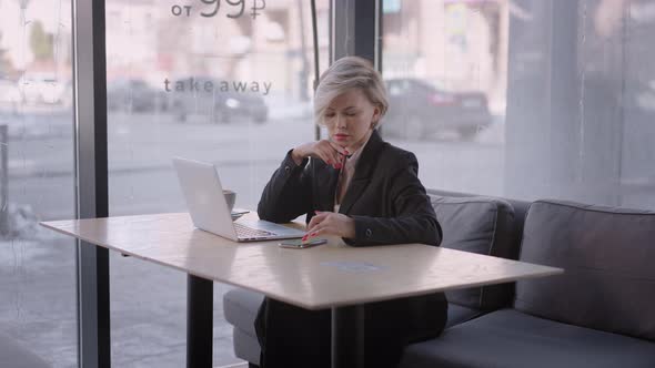 Businesswoman in a Cafe