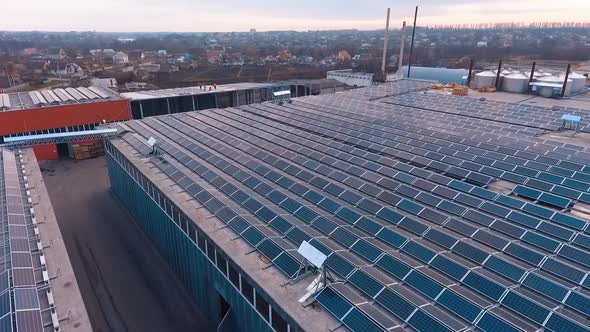 Solar electric power from above. Aerial view of solar energy on rooftop