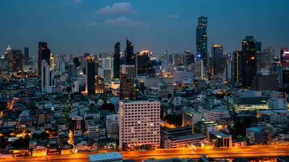 Time Lapse Night Cityscape and Highrise Buildings in Metropolis City Center