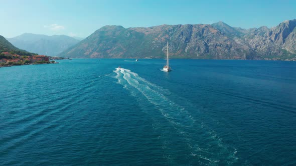 Boka Bay with a Sailing Yacht and Boats for Water Cruises