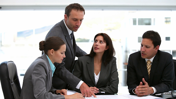 Boss Showing His Employees A Map