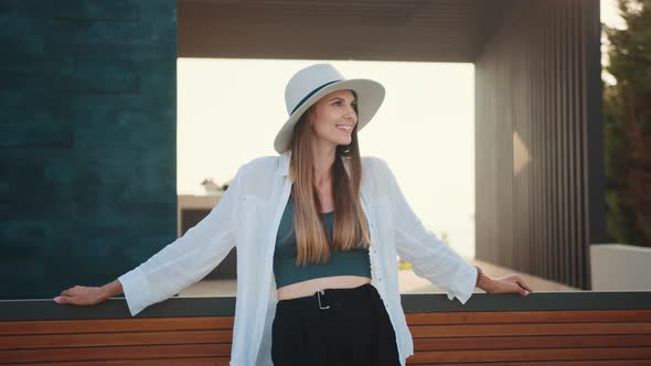 Pleasant Woman in Summer Outfit Posing Outdoors