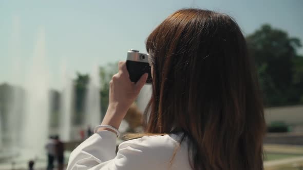 Circular Pan Shot Elegant Woman Making Photo Eiffel Tower Film Camera