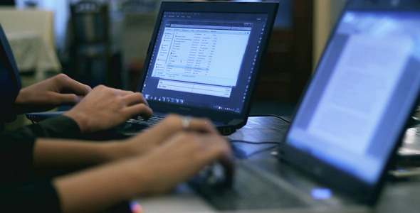 Business People Use The Computer alt