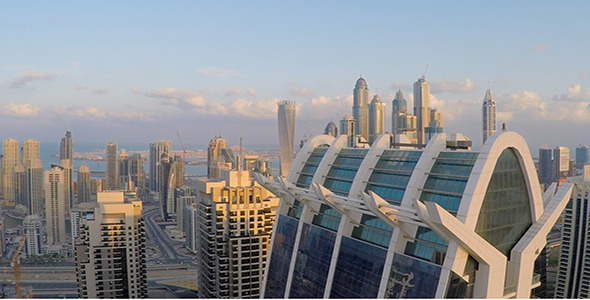 Drone Flying High Over Towers