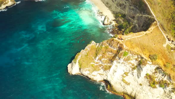 Aerial Top View a Lone Cliff Top House in Nusa Penida Island, Bali, Indonesia. Aerial View 