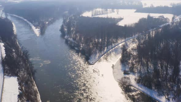 Confluence of river Elbe and Vltava in a snowy landscape,sunny,Czechia.