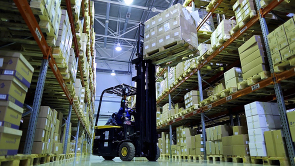 Modern Warehouse with Forklift Trucks