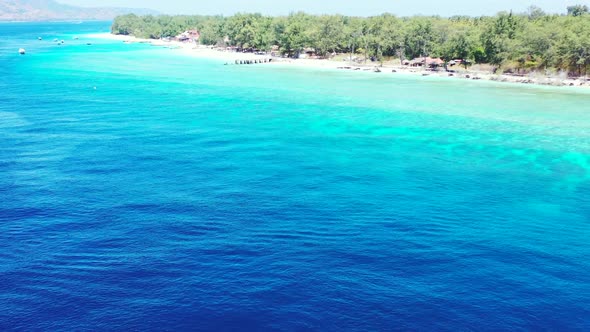 Aerial drone view panorama of beautiful coastline beach journey by aqua blue sea and bright sandy ba